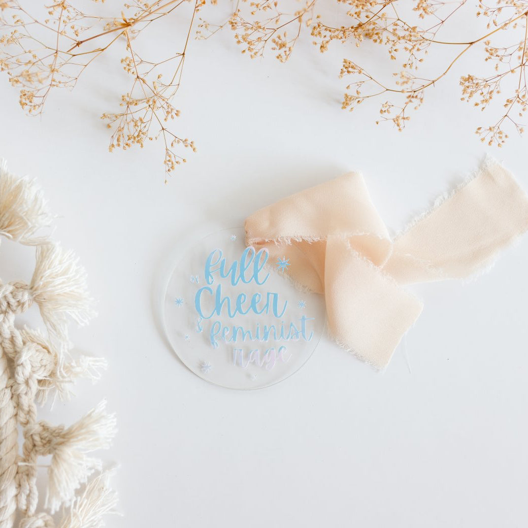 Decorative heart with 'Full Cheer' text on a white background with floral elements