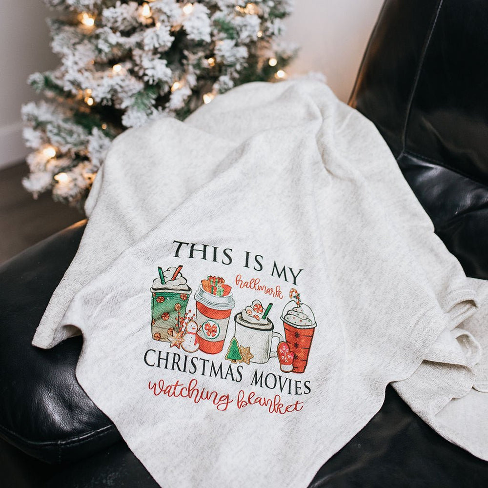
                  
                    Christmas Movie Watching Sweater Blanket - S & K Collective
                  
                