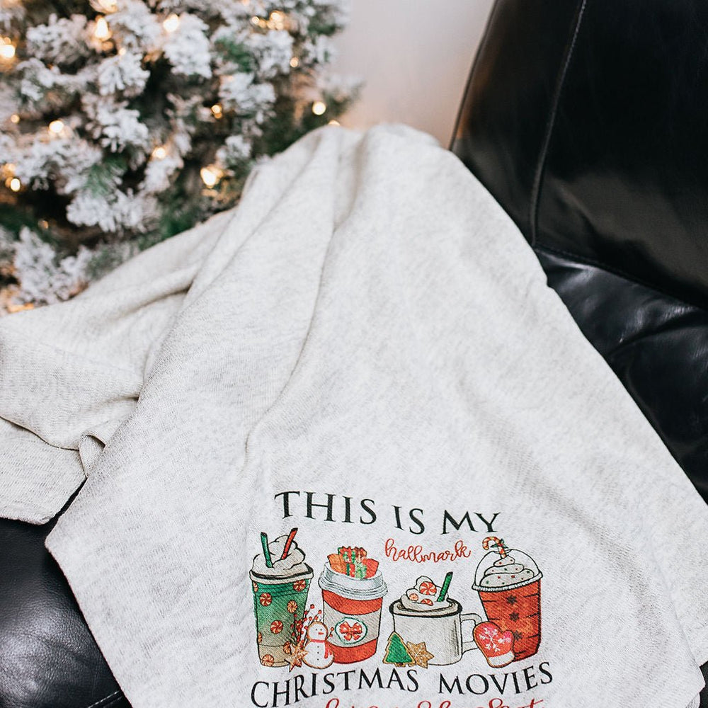 
                  
                    Christmas Movie Watching Sweater Blanket - S & K Collective
                  
                